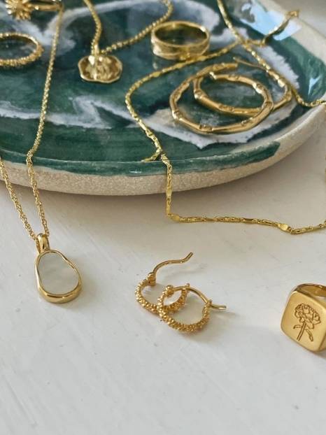23 Ethically-made & sustainable jewelry brands to shine with purpose