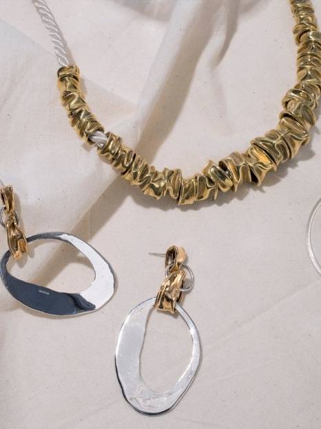 23 Ethically-made & sustainable jewelry brands to shine with purpose